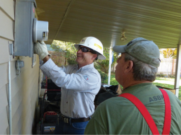 Man replacing meter