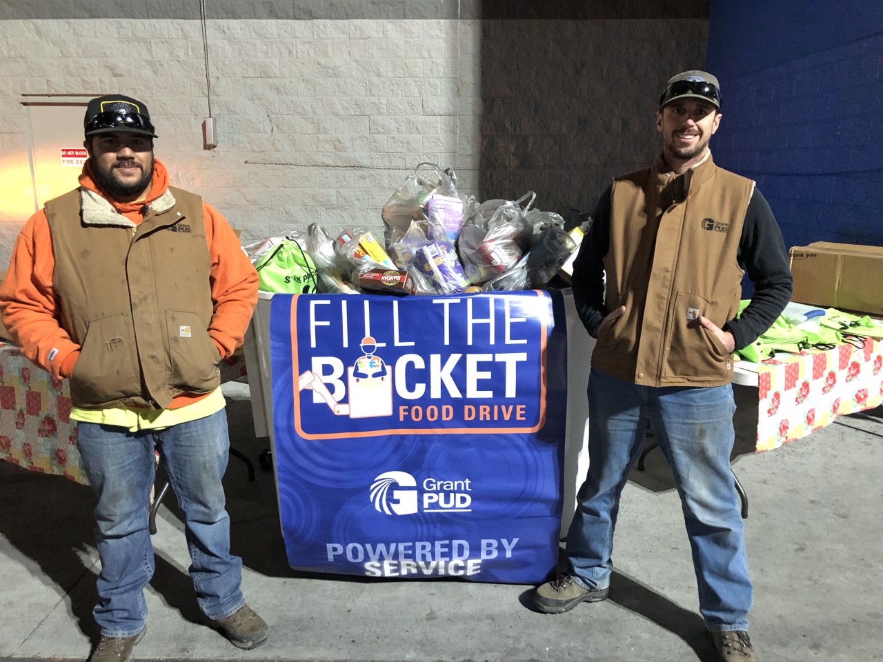 Two men standing outside Moses Lake Walmart.