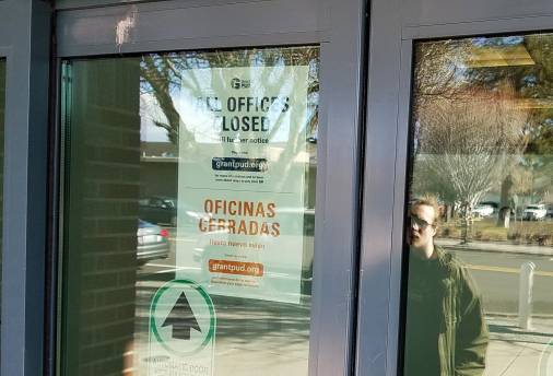 Offices closed sign on door
